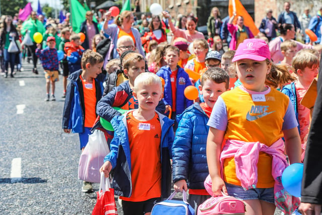 Pupils from Moira Primary and Rowandale Integrated take to the streets to celebrate the end of the school year. Pic credit: Norman Briggs, rnbphotographyni