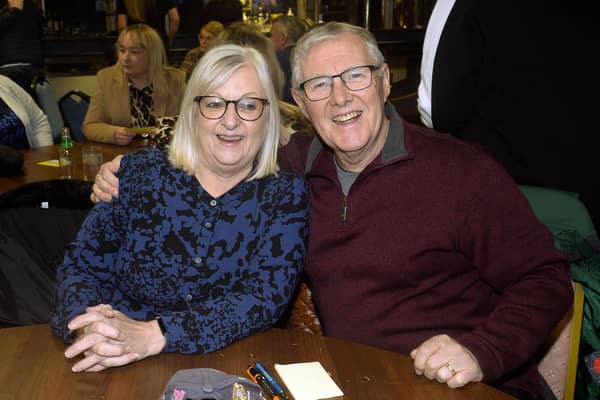 Julie and Jimmy Woods who enjoyed a fun night out at the Friends Of Portadown College table quiz in Portadown Rugby Club. PT09-212.