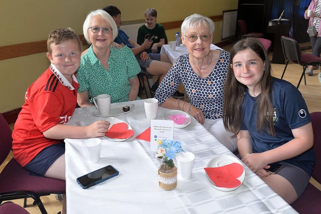Pictured at the Thomas Street Methodist Youth Fellowship coffee morning are from left, Luke Henderson (8), Violet Simpson, Rosalind Henderson and Ella Henderson. PT26-210.