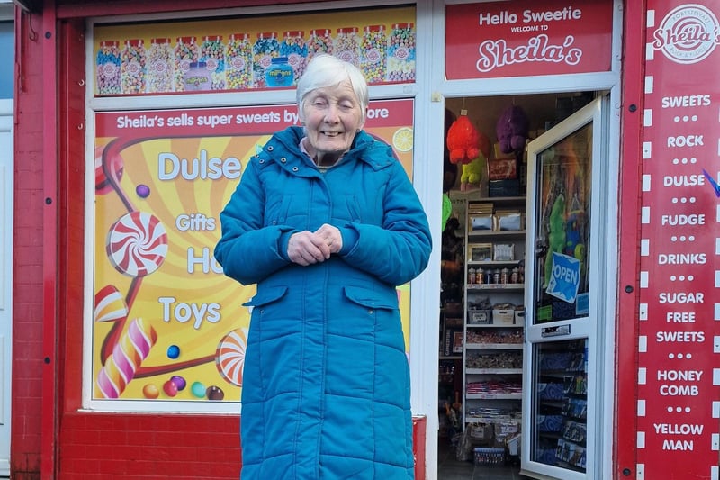 Sheila Conway pictured outside Sheila's Sweet Shop Portstewart marking the 60th anniversary