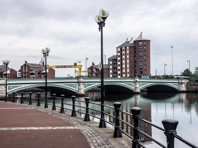 The Albert Bridge stretches across the River Lagan, bringing modern design to the north Belfast body of water. 
The end of the bridge features The Lady With The Hoop, a sign of development and peace for the once-troubled city.