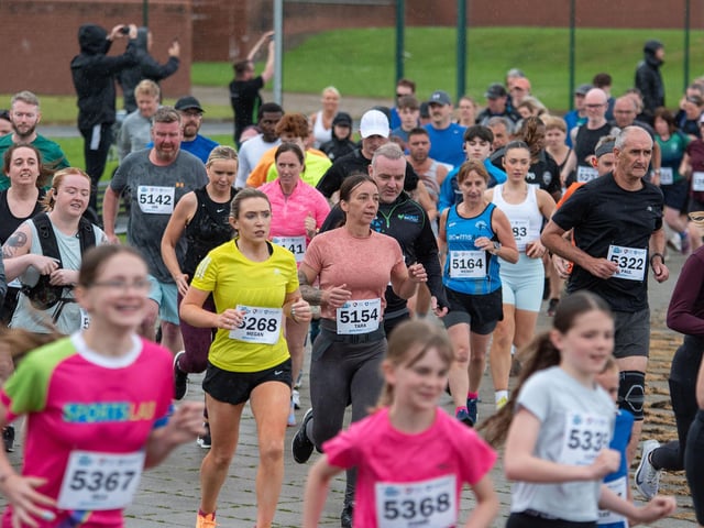 The 5K race stars off.