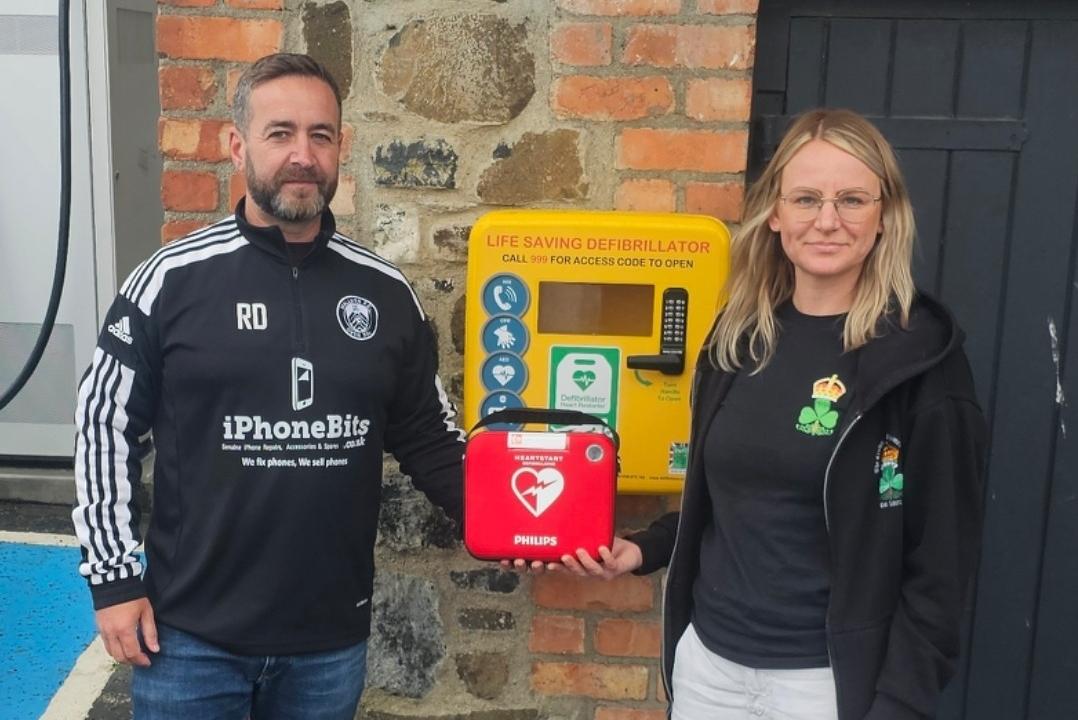 Newtowabbey football club funds new defibrillator in Mallusk