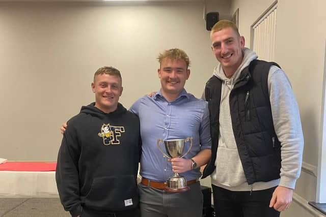 Darling Cup for, forward of the year, Tom McAllister, with Jake and Frank.