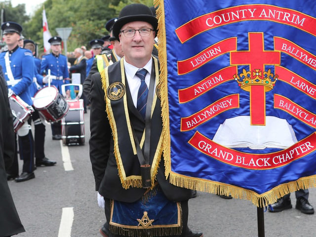 Pausing for a photo at the 'Last Saturday' parade in Larne.