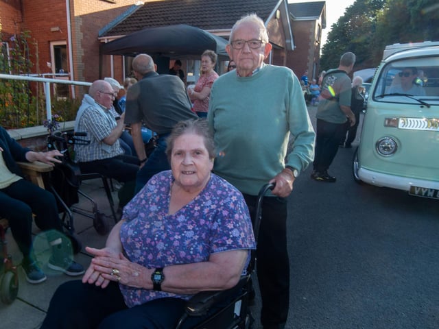Posing for the camera at the Mahon Hall vintage rally are resident, Pat Dodds and one of the vintage rally organisers, John Wilson MBE.