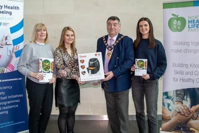 The Mayor of Mid and East Antrim, Alderman Noel Williams, with Karen Bruce, environmental health officer; Sandra Anderson, Northern Healthy Lifestyles Partnership and Orlagh McCaughan, business and community support officer.