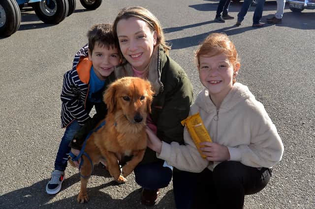 Heading for the dog show at the Annaghmore Parish HarvestFest on Saturday are members of the Wright family including, Eli (5), mum, Diane, Lucy (10) and dog, Cooper. PT42-200.
