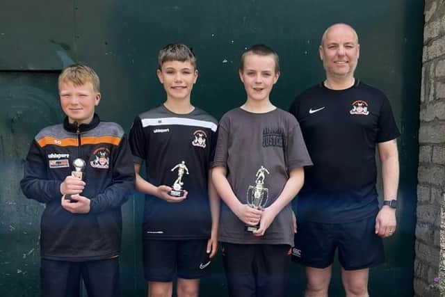 U12 award winners with coach Stephen.