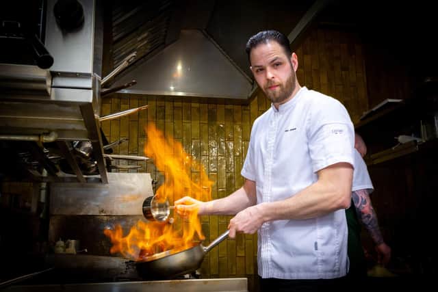 Alex Greene working in the kitchen at The Bucks Head in Dundrum
