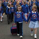 Taylar Haird and Chloe Willis lead the way on Killowen's walk to school in 2007