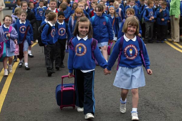 Taylar Haird and Chloe Willis lead the way on Killowen's walk to school in 2007