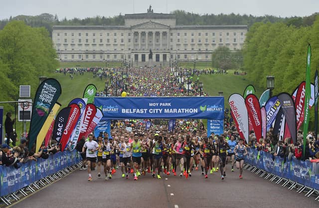 The Belfast City Marathon gets underway with a record number of entrants aiming to complete the 26.2-mile course..