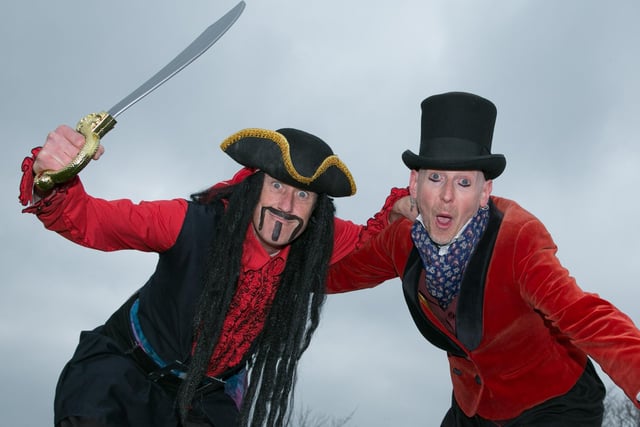 Stilt walkers Blackbeard and Jack Diamond providing the entertainment on May Day. INCT 19-435-RM