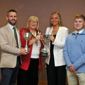 Lord Mayor of Armagh City, Banbridge and Craigavon, Councillor Mary O'Dowd with the Lurgan College staff whose teams won the MUSFA Under 16 Girls Cup and U16 Boys League. They are, Mr Neal Ross, vice principal and coach, Miss Sophie Gordan, coach and Mr Kyle McGuigan, coach.