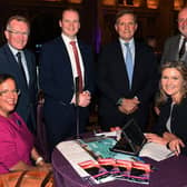 (Seated) Nella De Luca-Bertram, NDLB Europe Travel and Consultancy; and Liz Steele, Visit Causeway Coast and Glens; with (standing) Niall Gibbons, Chief Executive of Tourism Ireland; Tourism Minister Gordon Lyons; Christopher Brooke, Chairman of Tourism Ireland; and David Boyce, Tourism Ireland, at Flavours of Ireland 2022