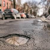 Stock image of a pothole. Picture: Adobe Stock