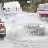 A torrential early morning downpour led police to issue a warning to drivers. Pic Colm Lenaghan/Pacemaker