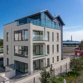 The Carrickfergus apartment has stunning views of Belfast Lough and the County Down coastline.  Photo: Hunter Campbell