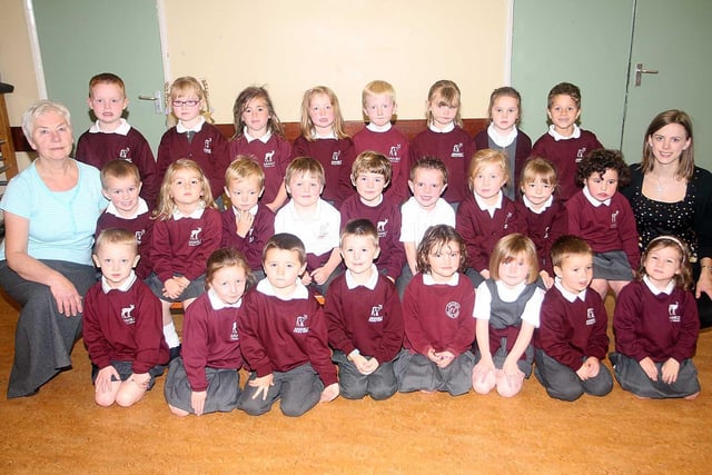 Annahilt Primary One Classroom Assistant Mrs Ruth Hughes and Teacher Mrs Leanne Greer pictured with their Primary One Class in 2008