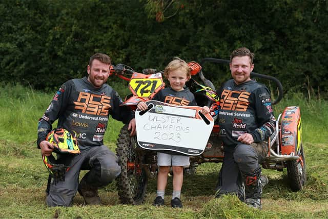 Ulster sidecar champions Neil Campbell and Ross Graham pictured with Casey. (Stephen Davison).