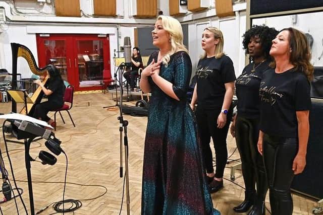 Natalie Rushdie recording ' Tell Me It's Not True' at Abbey Road with Coleraine harpist Lesley Magee pictured in the background. Credit Dave Bennett