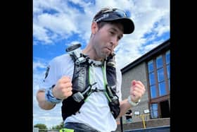 Thomas crosses the finish line during the Race Across Scotland ultra-marathon.  The Magheramorne man was competing in the event to raise funds for The Big C Foundation.  Photo: Race Across Scotland - GB Ultra team