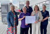 L-R Lisburn Voluntary Laundry Service volunteer Margaret Tweed, Voluntary Laundry Co-ordinator Jim Braiden, Interim Community Equipment Lead Philip Williams, Interim Assistant Director Primary and Integrated Care Janice Colligan and District Nursing Team Lead Andrea Beeks. Pic credit: SEHSCT