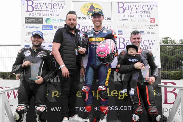 Davey Todd wins Hilton Car Sales Supersport race in 2022 with Adam McClean and Darryl Tweed alongside sponsor Andy Hilton. Credit Stephen Davison, Pacemaker