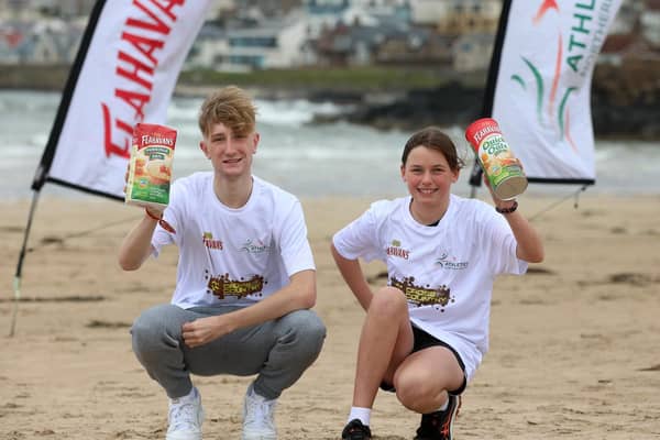 Eva McCreery from Culcrow Primary School  pictured alongside Nick Griggs, Athletics NI ambassador
