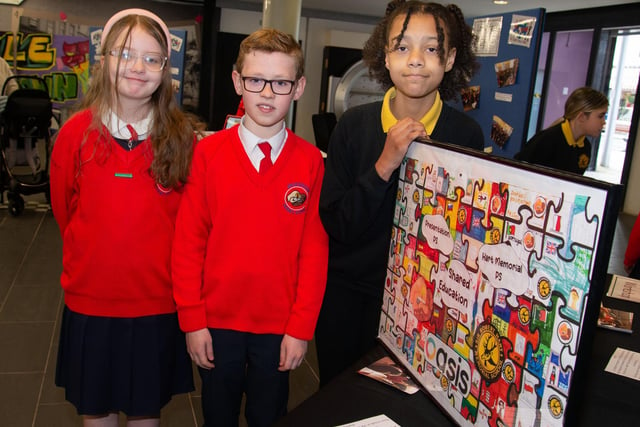Pupils from both schools enjoying the Hart and Presentation Primary Schools Shared Education celebration. Included are from left, Robyn Humpheries, Harvey Wilson and Imani Katumba. PT18-235.
