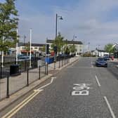 Contractors are working to fix the damage caused following a collision in The Square area of Ballyclare. (Pic: Google).