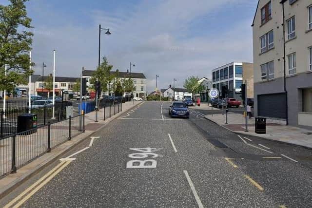 Contractors are working to fix the damage caused following a collision in The Square area of Ballyclare. (Pic: Google).