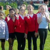 Some of the pupils who enjoyed the exercise, sports skills and picnic event on Wednesday. PT23-238.