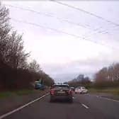 Screenshot of dashcam footage as woman asks the public for more information following her dad's car collision.