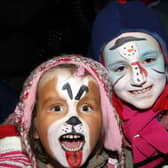 Grace and Maria show their painted faces during the switch on of the Christmas Lights in Portstewart in 2010