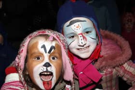 Grace and Maria show their painted faces during the switch on of the Christmas Lights in Portstewart in 2010
