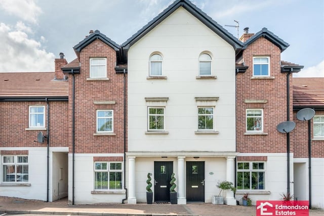 The deceptively spacious, well presented mid-townhouse is in the popular Castle Meadows development, Castledawson.