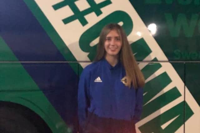 Ellie Scott in front of the NI Bus