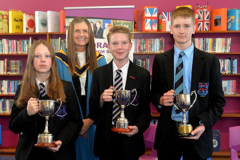 Tandragee Junior High School vice principal, Mrs Laverne Inns pictured with pupils who recived awards for academic achievement and  excellence at the school prize day. Included from left are, Molly Crowe, Bobby McWilliams and Charlie Poole. PT44-204.