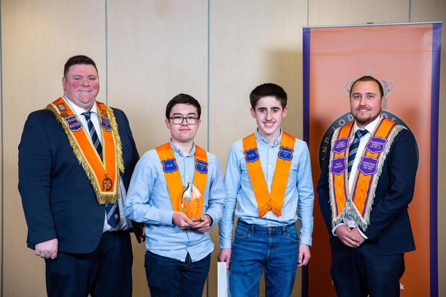 Royal Hillsborough Junior LOL 55 were the winners of the Junior Grand Lodge Award at the 2023 Orange Community Awards. Junior Grand Master Wor. Bro. Joseph Magill presents the award to Bros. Samuel Sneddon, James Cairns and Marc Cairns. Pic by Graham Baalham-Curry