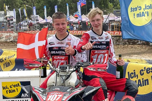Moria teenager Todd Dillon pictured with team mate Mikkel Kurdahi from Denmark after winning the 4hr and under16 races with a third overall in Pont-de-Vaux quad race in
France. Picture: supplied by Maurice Montgomery