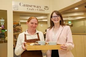 Minister Dr Caoimhe Archibald is pictured with Diane Malcolmson, Causeway Craft & Coffee Shop, in the Diamond Centre, Coleraine. CREDIT LORCAN DOHERTY