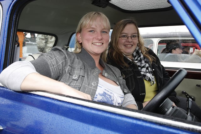 Joanne Caldwell and Maria McLaughlin sit in their Mini during the Mini Festival in Portrush in 2009