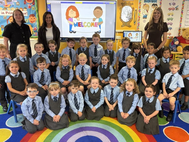 Miss Mahaffy's P1 class at Waringstown PS with classroom assistants Miss Carson and Mrs Gishkori.