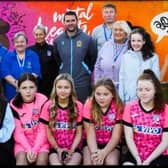 David Healy alongside Brian Kerr and members of the local community at the unveiling of the new Listening Ear murals in Rathcoole. (Pic: Contributed).