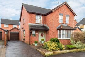 The property has an attractive red brick exterior.