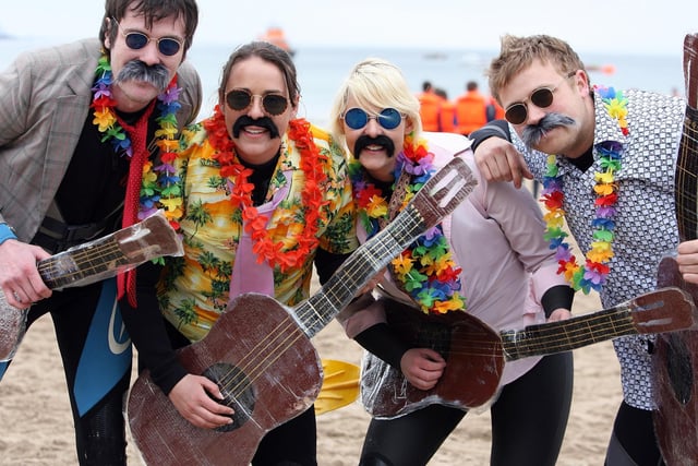 GROOVY GUYS...The Beetles entertaining at the RNLI Raft Race in Portrush in 2010