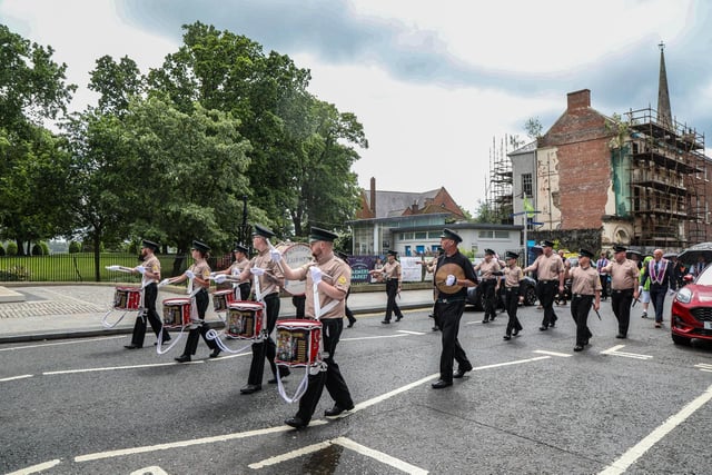 Orangemen gather for the Empire Sunday parade in Lisburn and church service at Lambeg Parish