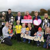 Kilcoo GAC is just one of 300 GAA clubs in Ulster to join the Public Health Agency’s Breastfeeding ‘Welcome Here Scheme’. Pictured with members are Michael McArdle, Public Relations Officer at Ulster GAA, Dr Hannah Dearie, Senior Health and Social Wellbeing Improvement Officer with the PHA, Michelle O’Hagan, Infant Feeding Lead Midwife at the Southern Health and Social Care Trust